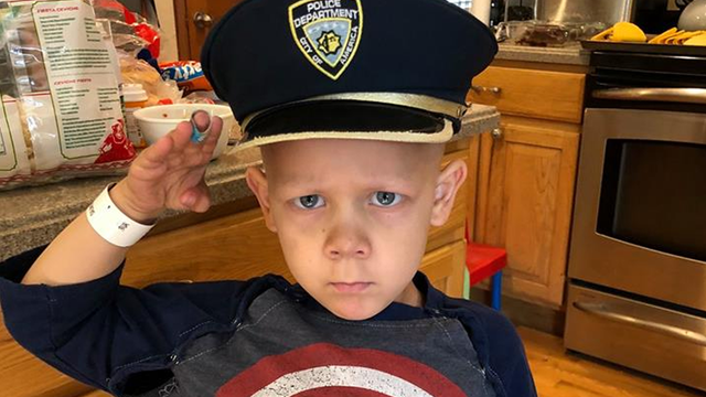 Colorado boy, 4, battling stage-four cancer, celebrates end of chemo as honorary police officer