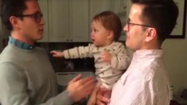 Baby cannot figure out which twin is his real father
