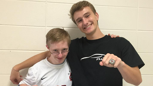 Soccer manager with down syndrome honored by teammates
