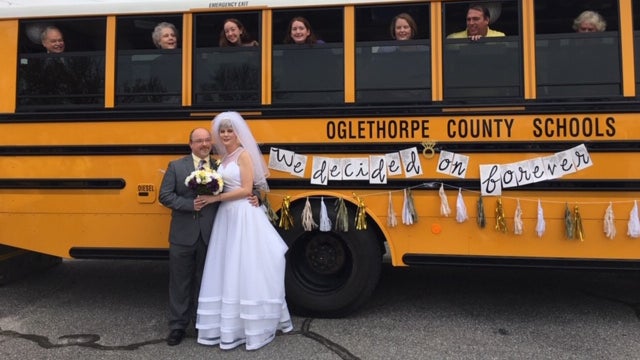 Georgia teachers tie knot in special school bus wedding