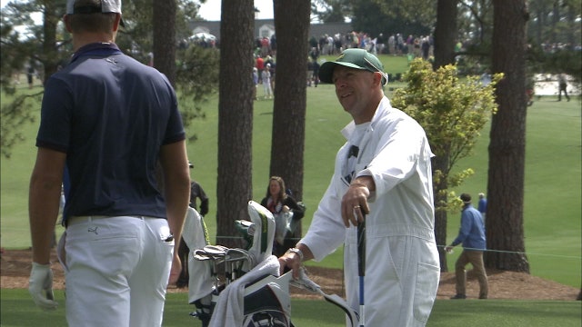 Caddie moves on from troubled past as he works Masters