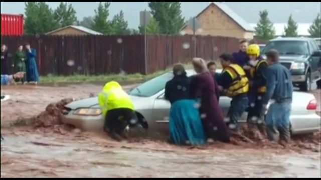 Floods kill 8, leave 5 missing in town known for sect leader