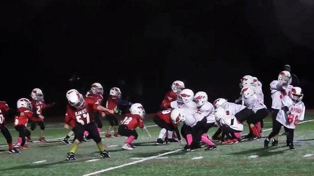 Kids hear favorite song and start dancing mid football game