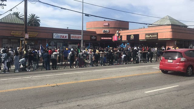Thousands of fans pack notable spots on Nipsey Hussle funeral procession route