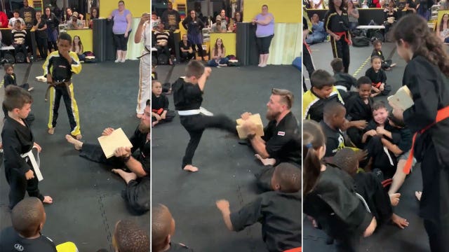 5-year-old boy breaks board with heel after several failed attempts as classmates cheer him on