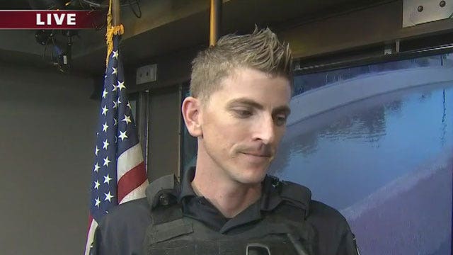 Mesa police officer rescues dog from canal