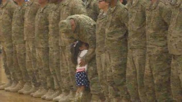 Little Girl Rushes Dad at Homecoming Ceremony