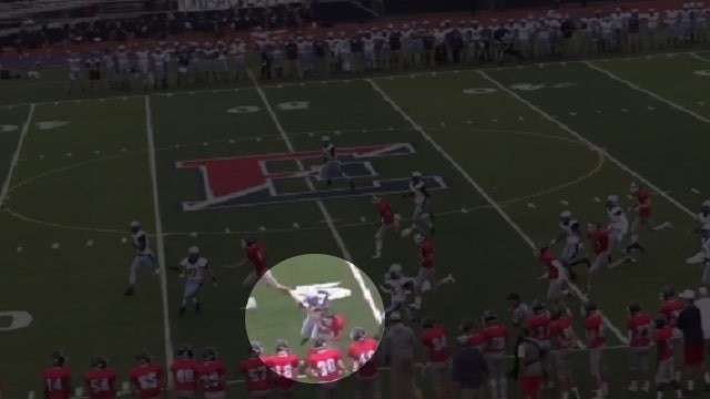 Girl power! High school kicker stops return