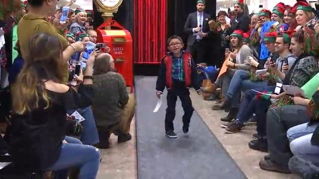 Wish granted: 8-year-old boy walks in runway show at Mall of America