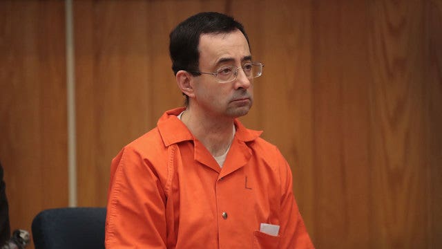 Nassar lawyers say he was assaulted in prison