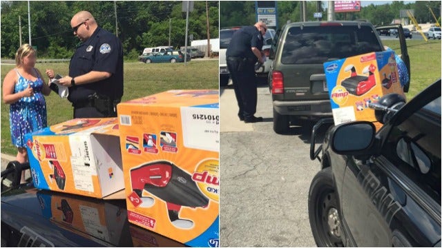Hiram police officer gives needy mother booster seats