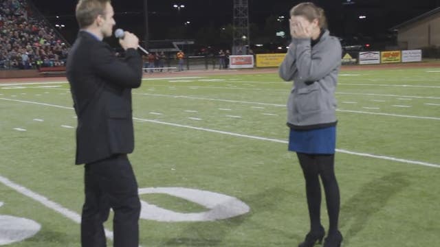 Music instructor plans surprise proposal at band competition