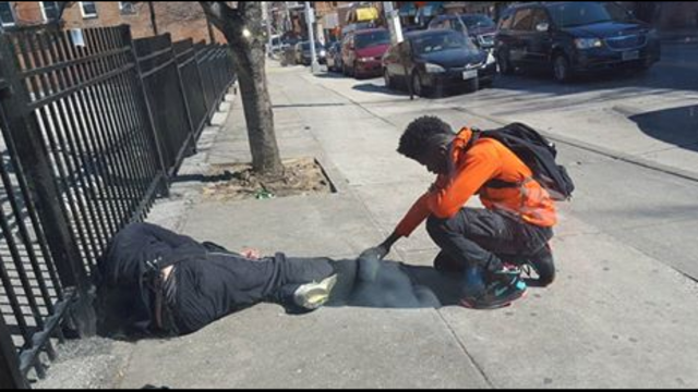 Photo of boy praying over homeless man goes viral