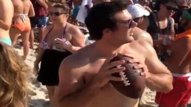 Spring breaker nails police car with football, warrant issued