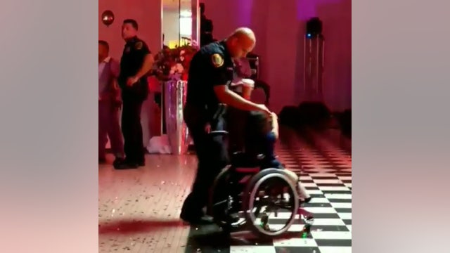 Houston officer asks little girl in wheelchair to dance