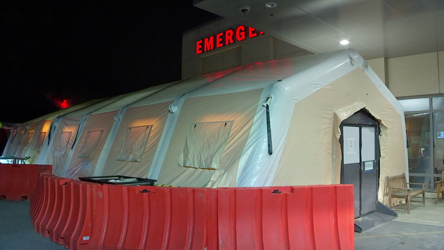 Hospitals set up tents with extra examination areas due to rush of flu patients