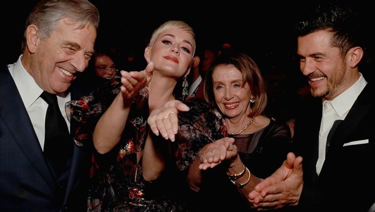 5d52db34-GETTY_nancy pelosi katy perry_021019_1549824266582.png-402429.jpg