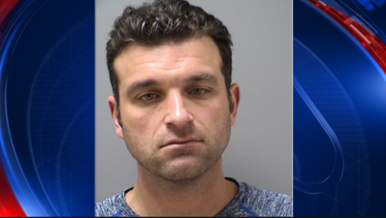 Deputy arrested_Johnathan Nuzzo_1498934243031.PNG