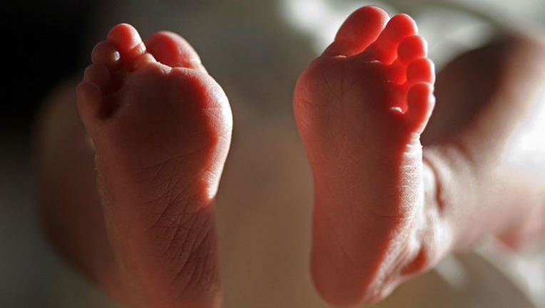36283215-GETTY-newborn-baby-baby-feet-infant_1555624130288-407068.jpg