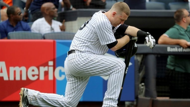 2ff89d03-GETTY Todd Frazier Yankees Kneel-401096