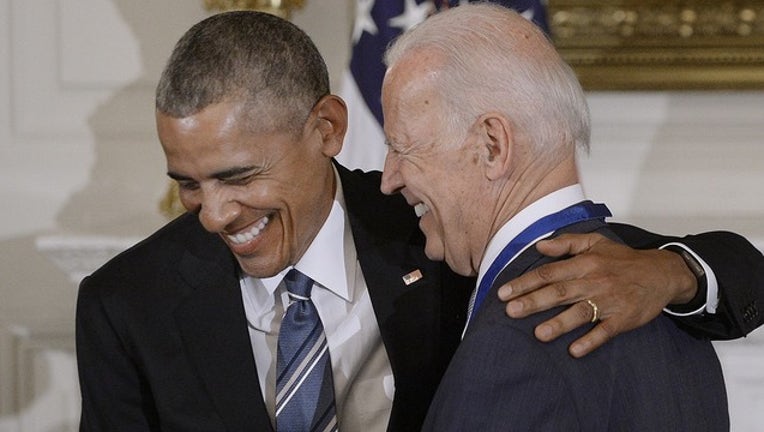79bd99e8-GETTY biden obama_1554472394729.png-402429.jpg