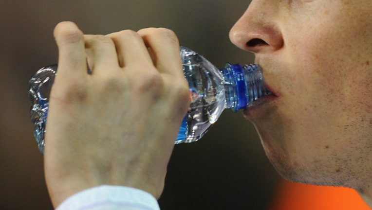 GETTY water bottle drinking_1553559487329.jpg-404023.jpg