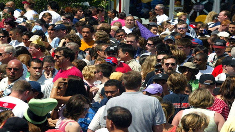 87c1c337-GETTYDIsneylandcrowds53238157MS007_Space Mountain_1553804518364-407068