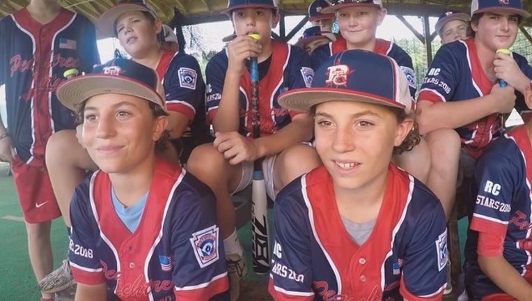 P LITTLE LEAGUE CHAMPS 5P_00.01.08.13_1533856351307.png.jpg