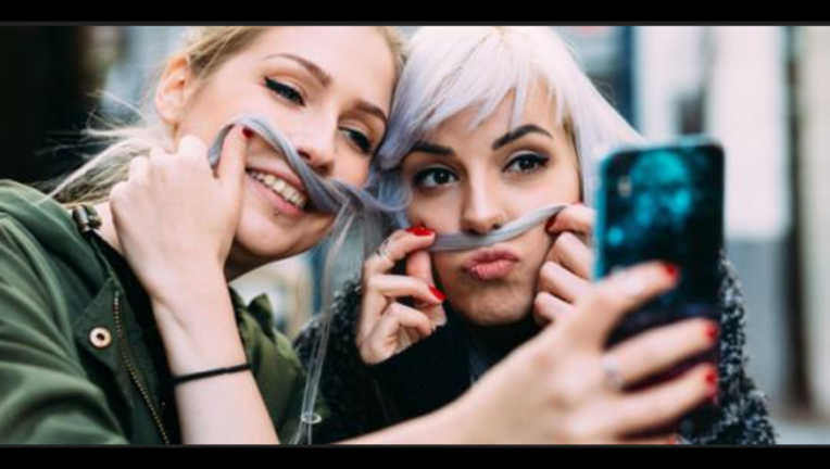 0dd82892-Millennial teens grow up more slowly