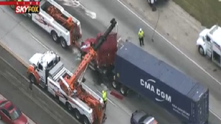 fb6eaf77-WAGA_I285TractorTrailerCrash_071219_1562951940991.PNG
