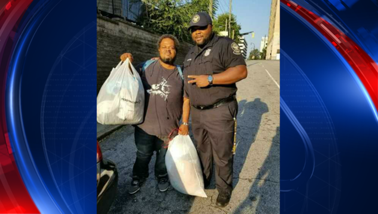 f440d188-atlanta cop helps man_1505501098980.png