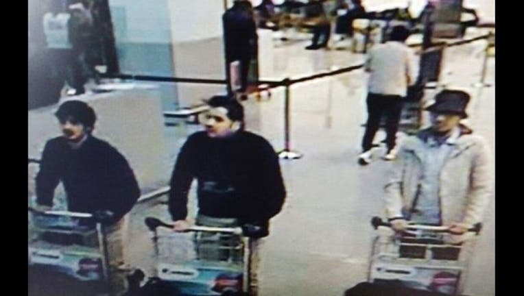 These three men are suspects in the Brussels terrorist attacks and the man in the hat may be still on the run-404023