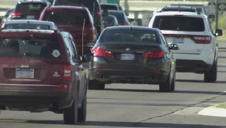 7f2c23cd-cars driving blurred_1529790365537.jpg-401096.jpg