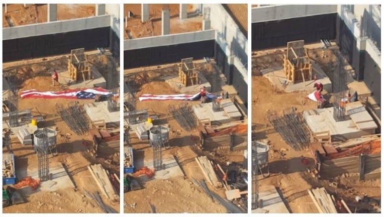 46128863-man folds flag_1467649382702.jpg
