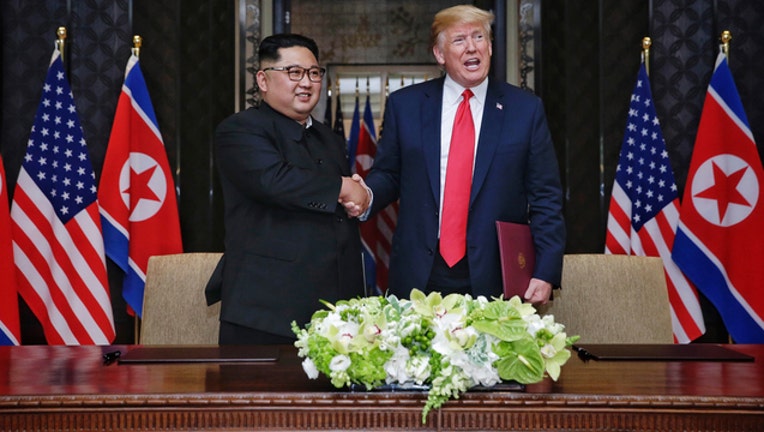 Donald Trump and Kim Jong-un (GETTY IMAGES)-401720