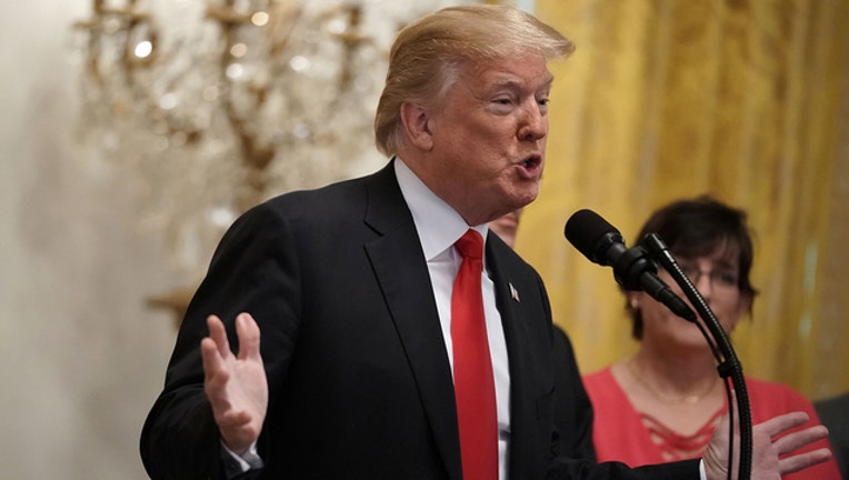 da1559ea-Trump Tax Cuts and Jobs Act (GETTY IMAGES)-401720