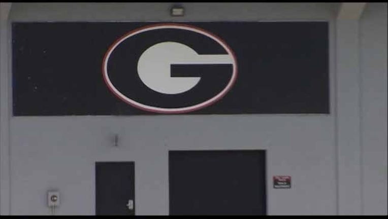 755c59c5-UGA football field logo