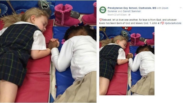 viral photo of girls holding hands_1458813331466.jpg