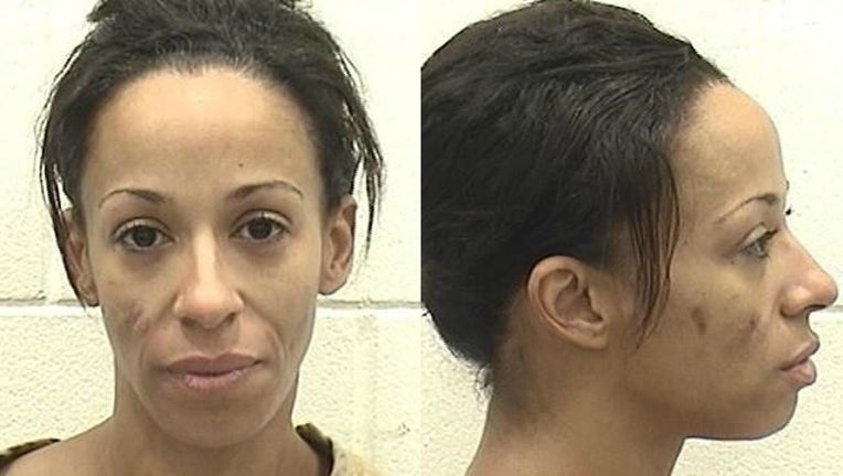 5afdc82d-woman arrested home invasion_1501779348675.jpg