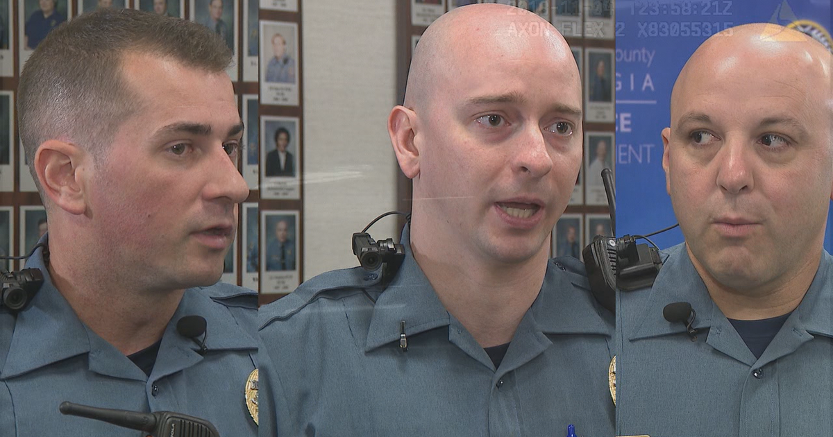 Police officers save man pinned by car | FOX 5 Atlanta