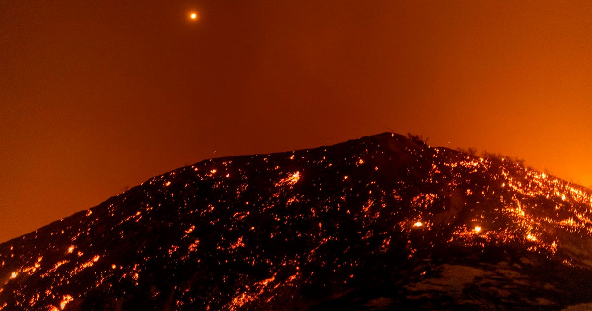 Thousands forced to evacuate in Los Angeles amid raging wildfire as 7 ...