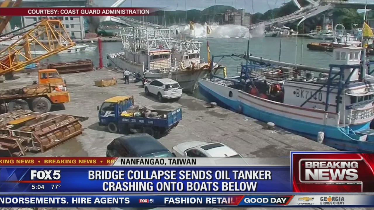 Bridge collapse sends oil tanker crashing into boats