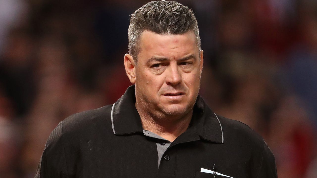 Major League Baseball umpire Rob Drake looks on from the field during  News Photo - Getty Images