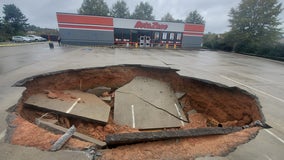 Sinkhole forms in parking lot of Dawson County business