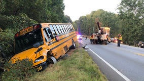 Police search for driver who hit Cherokee County school bus