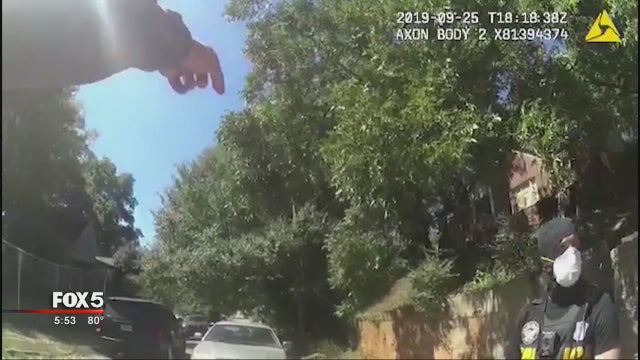 Calls for action after APD officer points gun at civil rights activist