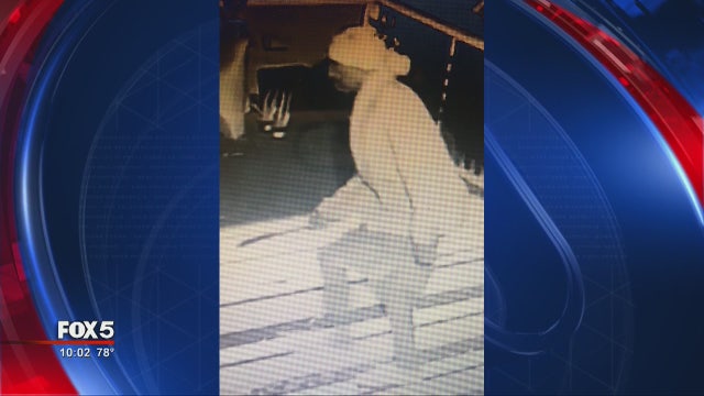 Video shows knife-wielding man prowling behind Midtown home