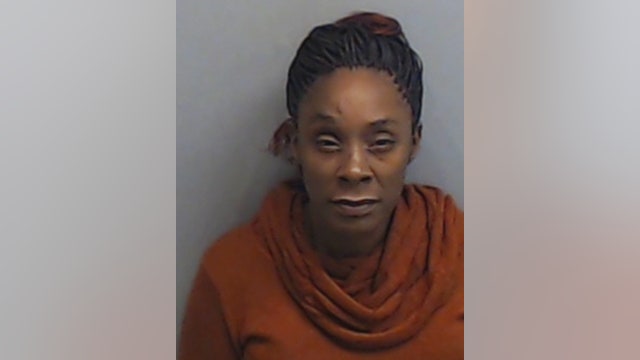 Woman sentenced to life for murder of 'Tin Man' street performer