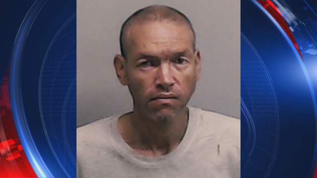 Police: Driver arrested after striking woman, leaving her in the middle of the road