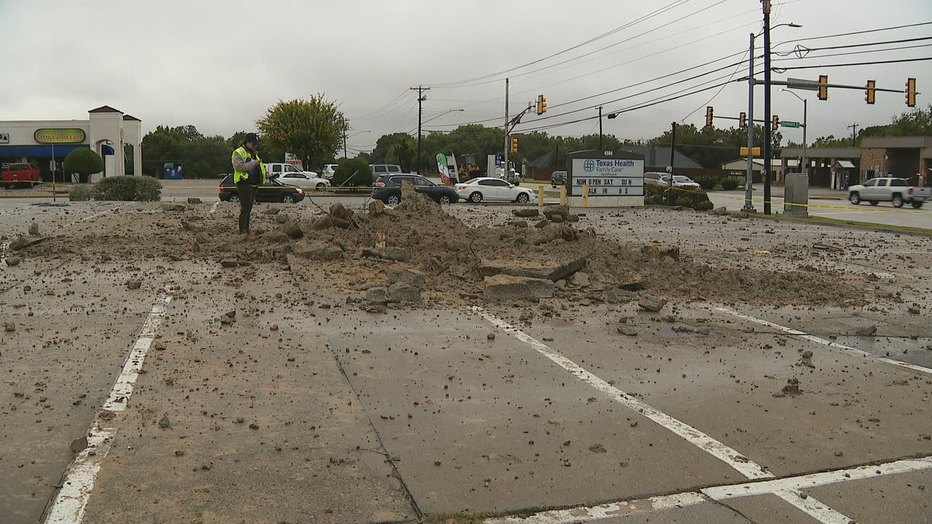 Lightning strike leaves 15-foot hole in Fort Worth parking lot